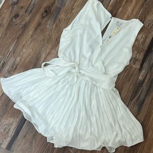 NWT Flowy white open back romper